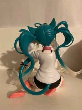 Teal Twin-Tail Anime Figure with Pink Accents